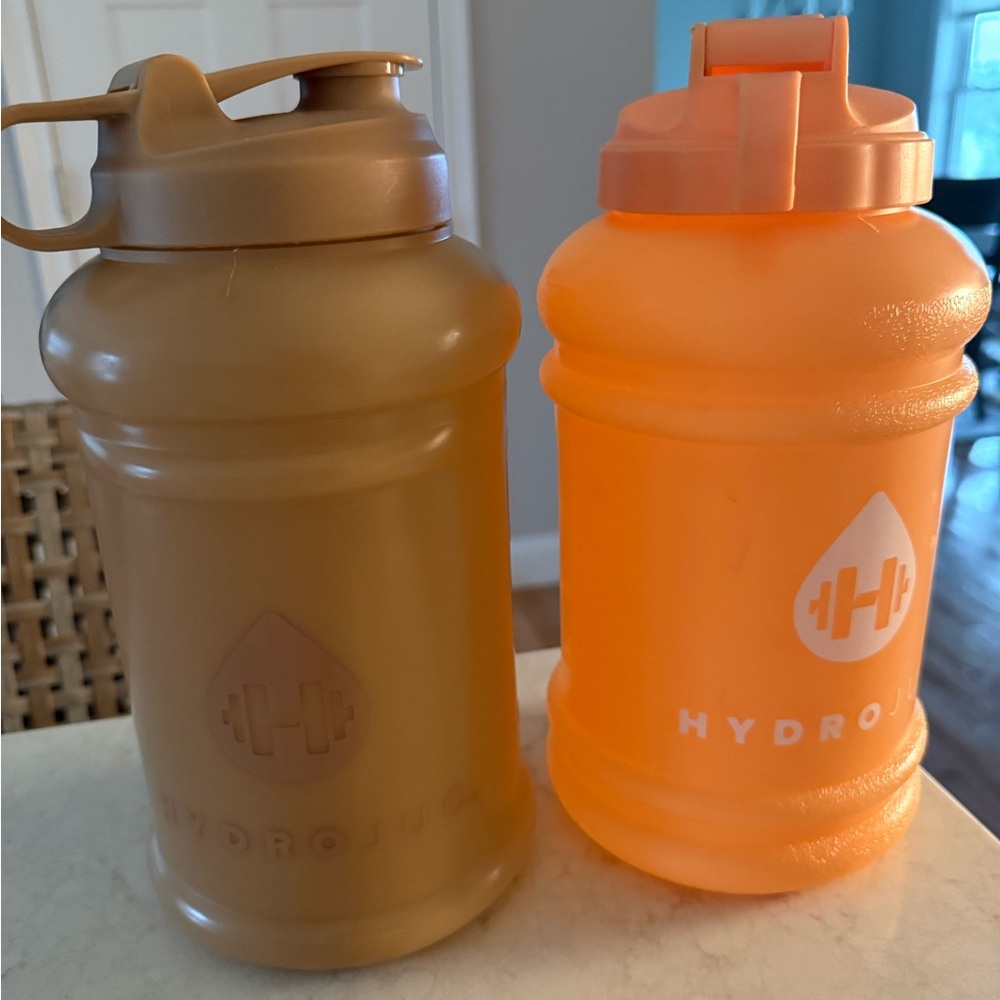 HydroJug Vibrant Orange and Warm Tan Bottles